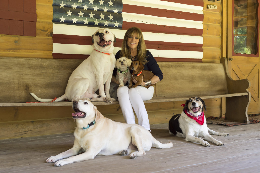 Portrait of Today Show's Jill Rappaport with her rescue dogs