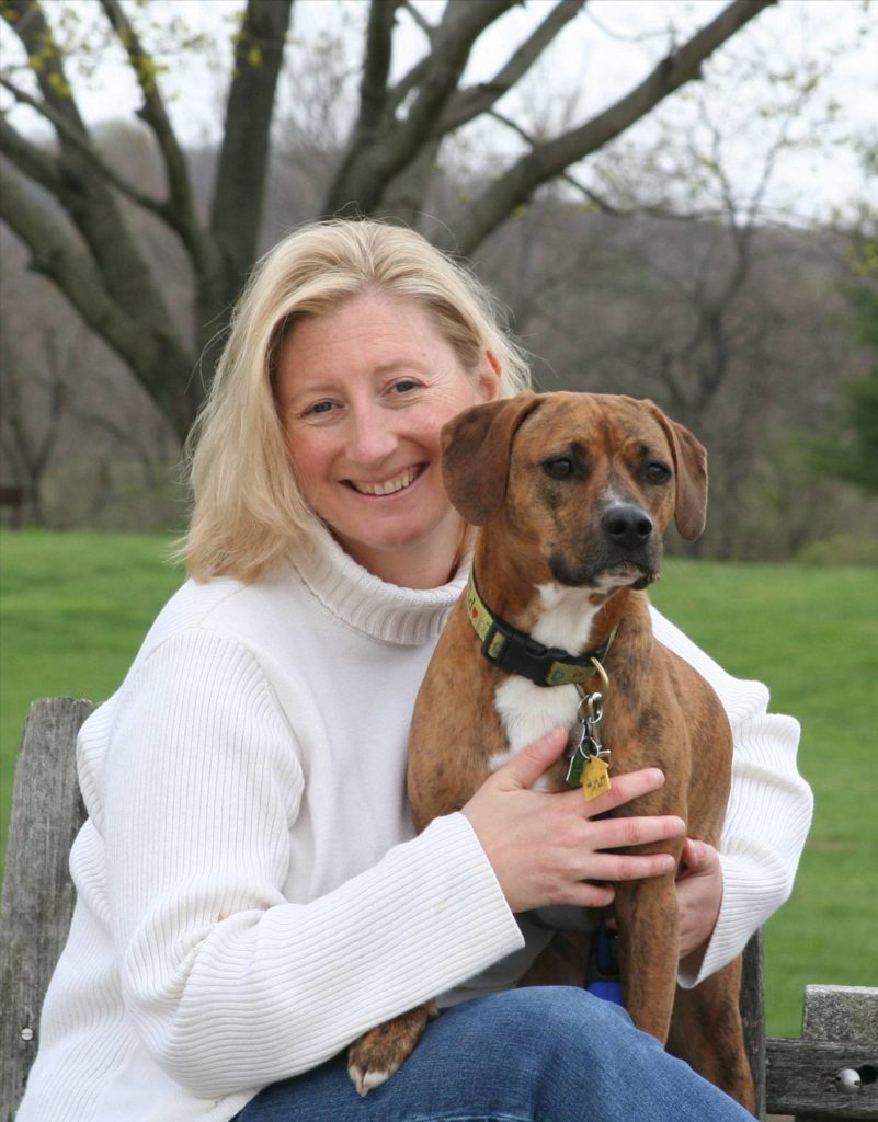 How different are breeders from dog rescue groups? Less than you think. Author of The Dog Merchants, Kim Kavin & her dog, Blue.