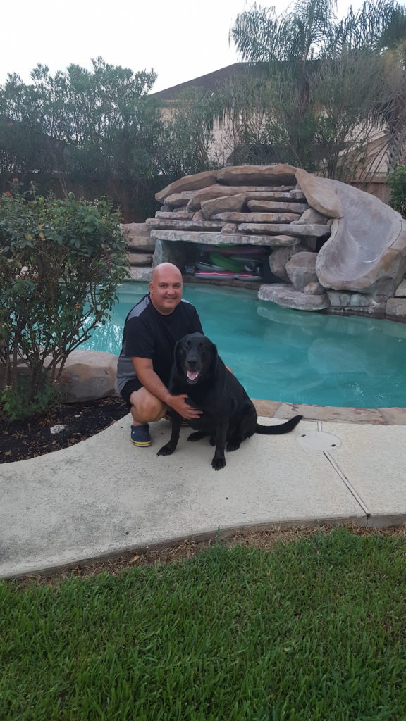 Dog-friendly houses being offered by national builder. Jim Ellison of Taylor Morrison, the builder, and his Lab, Bo. 