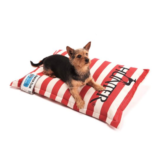 A designer dog bed with a nautical look in red and white stripe cotton canvas.