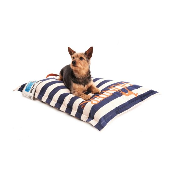 A designer dog bed with a nautical look in navy and white cotton canvas.