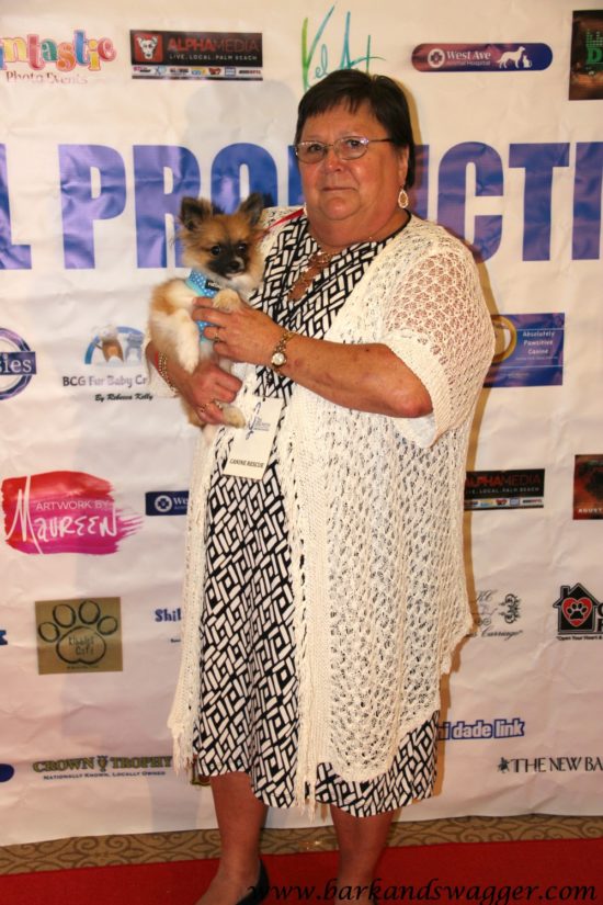 Designer dog fashions big night at the Fabulous Cotillion. Here is Canine Rescue's Barbie Younce with Stuart, a puppy mill rescue she brought to the event. 