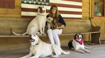 Portrait of Today Show's Jill Rappaport with her rescue dogs